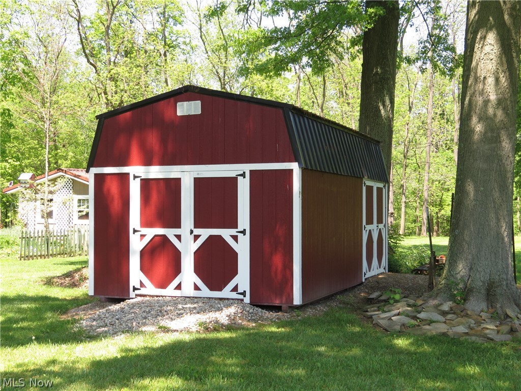 9811 Church Road Huron, OH 44839 - Photo 10 of 28 View of shed / structure featuring a yard