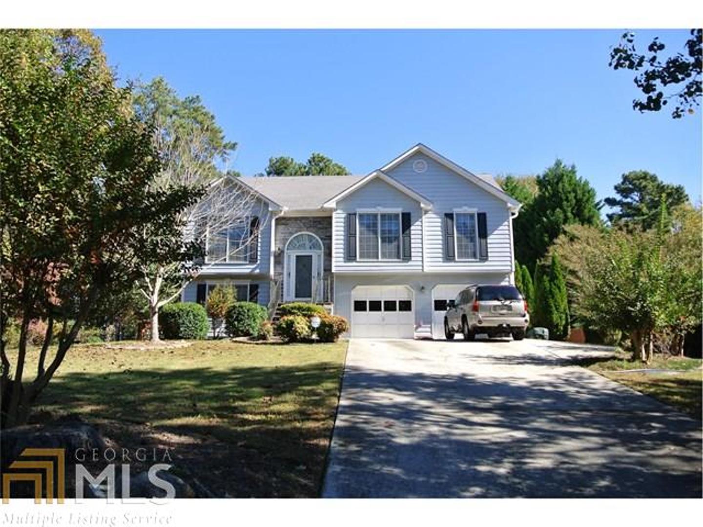 1804 McConnell Road Southeast, Unit 11 Grayson, GA 30017 - Photo 1 of 1 a view of a house with a yard