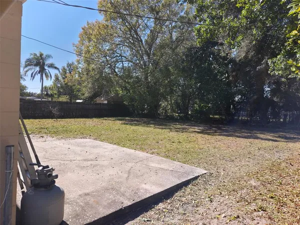 a house with trees in front of it
