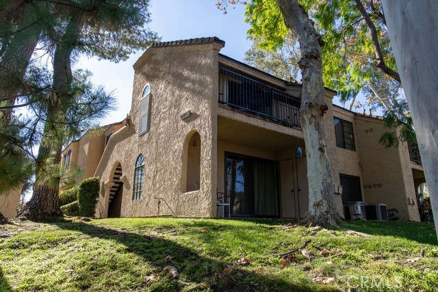 600 Central, Unit 374 Riverside, CA 92507 - Photo 18 of 23 a view of a house with a yard