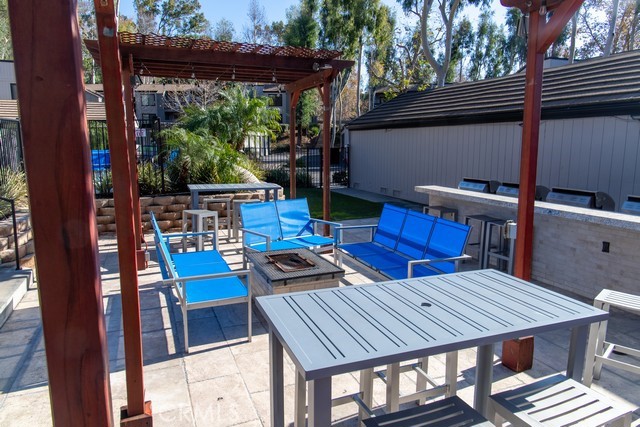 600 Central, Unit 374 Riverside, CA 92507 - Photo 23 of 23 a view of balcony with wooden floor and outdoor seating
