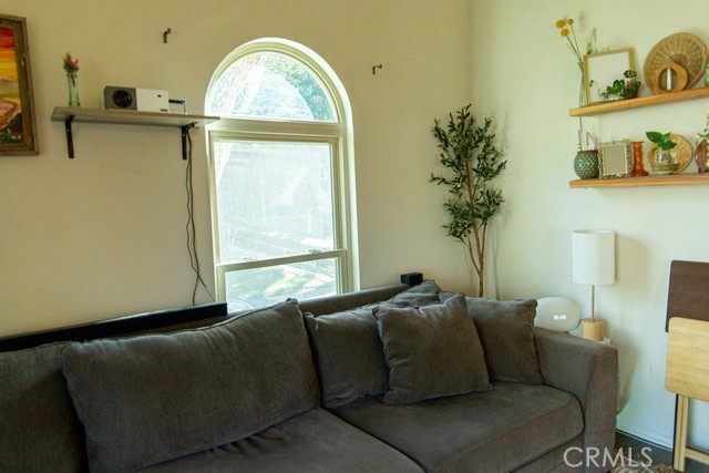 600 Central, Unit 374 Riverside, CA 92507 - Photo 6 of 23 a living room with furniture and a large window