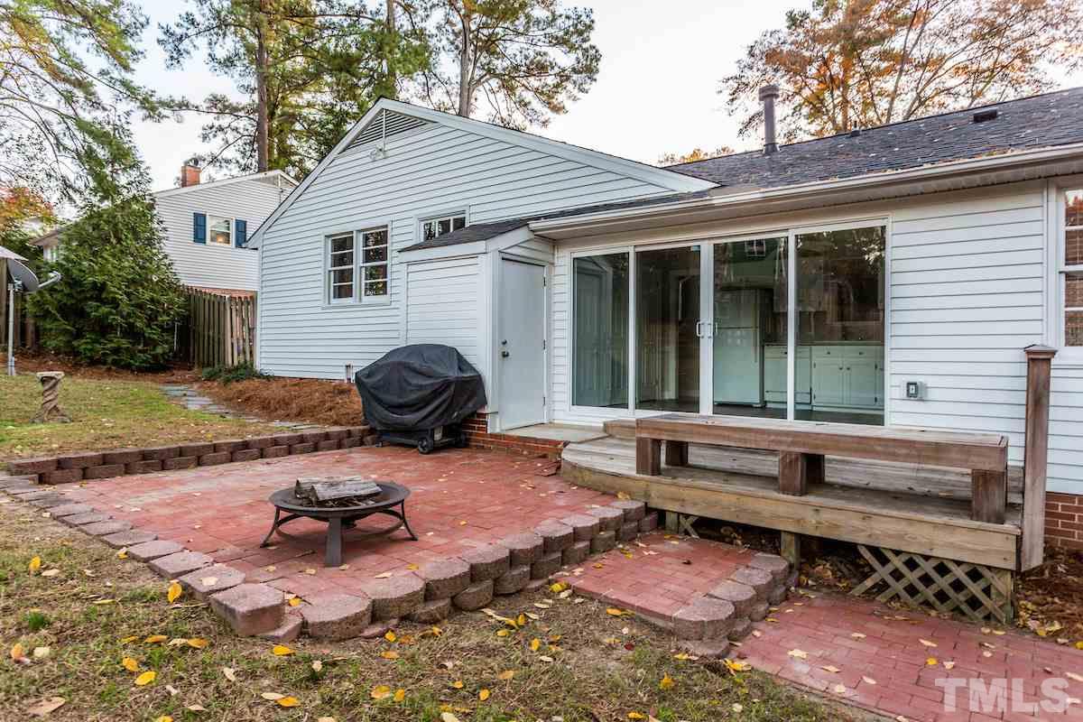 307 Acorn Street Raleigh, NC 27604 - Photo 19 of 24 a view of a backyard with sitting area