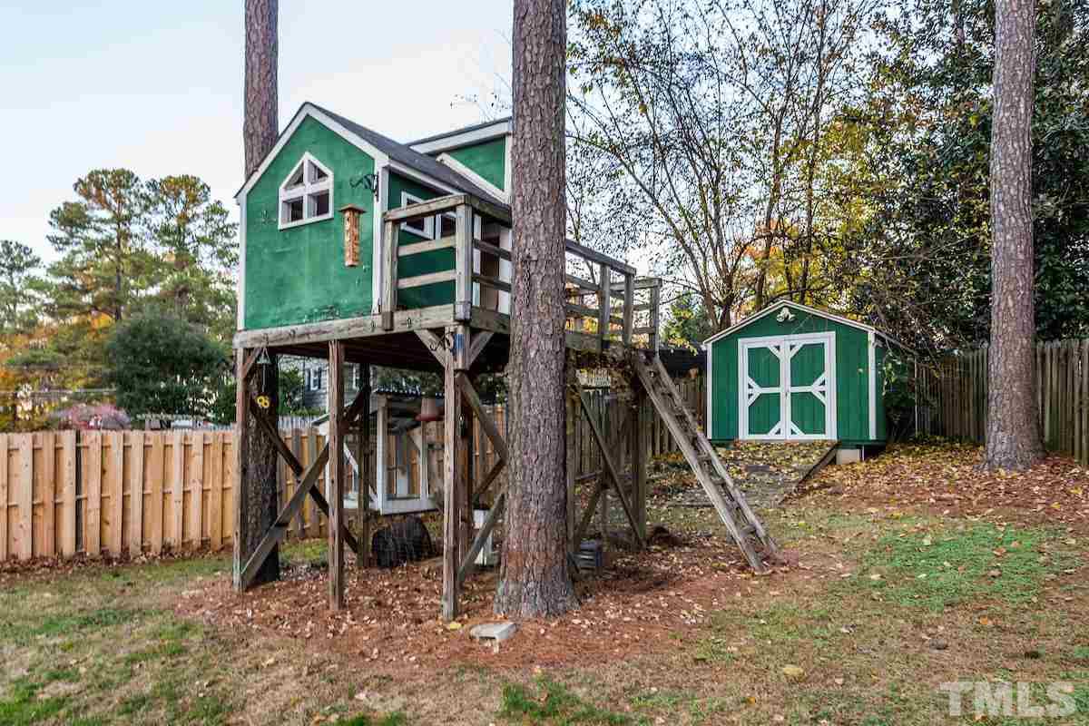 307 Acorn Street Raleigh, NC 27604 - Photo 24 of 24 a front view of a house with a yard