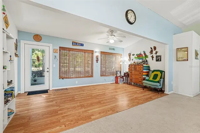 a living room with furniture and window
