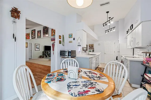 a view of a dining room with furniture