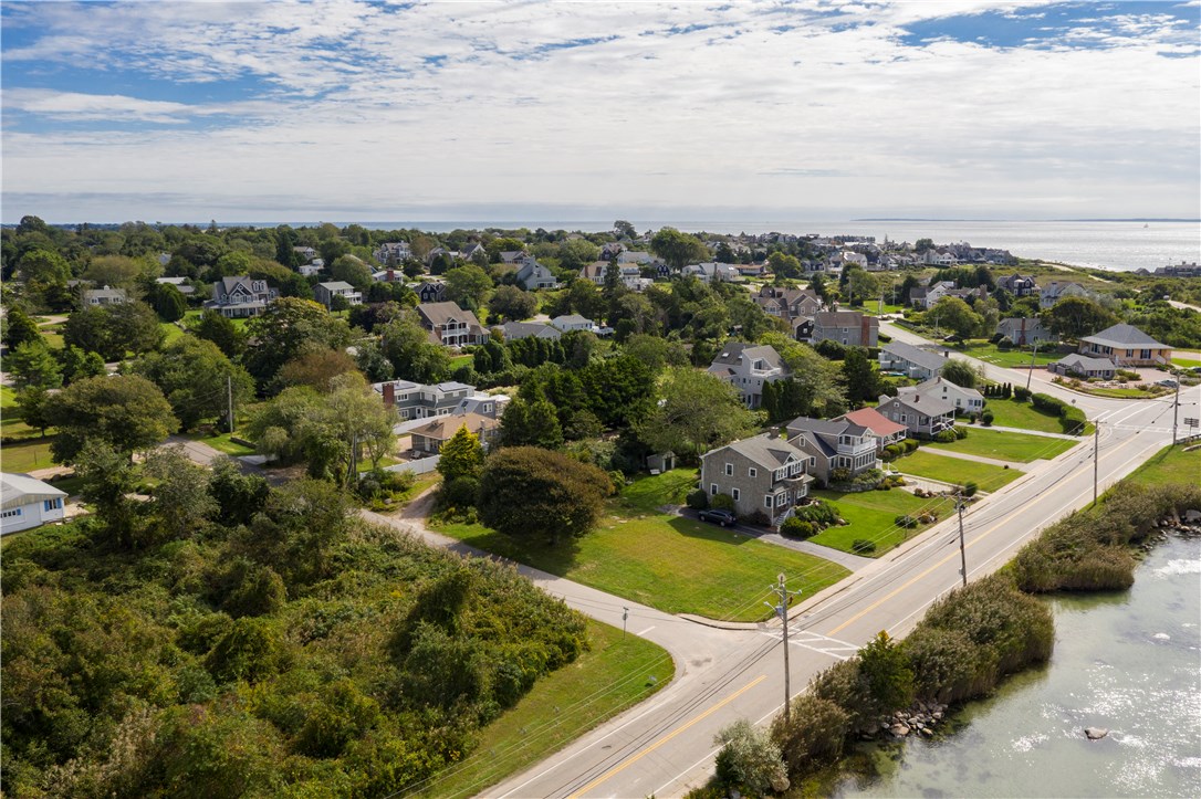 11 Weekapaug Road is the southern corner of Chapman Road and Weekapaug Road. Walk up Chapman to the community ballfield, tennis courts, and croquet. Walk down Weekapaug Road to the community library & the Innlet for Sandwiches, Ice Cream, or the morning paper. Enjoy access to Fenway Beach & the Weekapaug barrier beach, plus ability to join the Weekapaug Yacht Club.