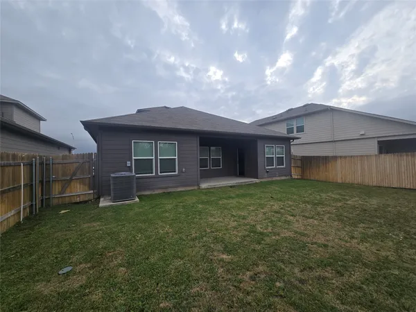 a view of a house with a garden