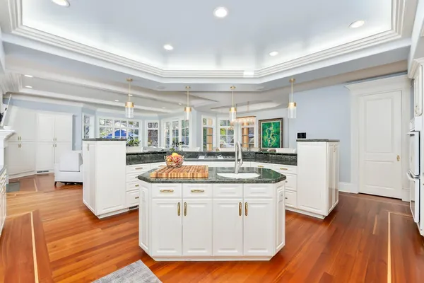 a view of kitchen with furniture and white doors