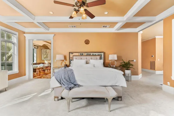 a view of a livingroom with furniture and white walls
