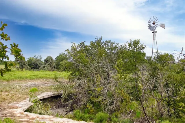 a view of an ocean and city