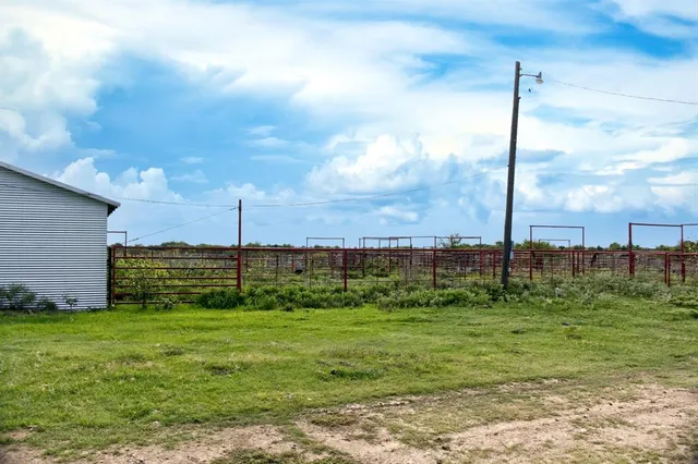 a view of a lake with a big yard