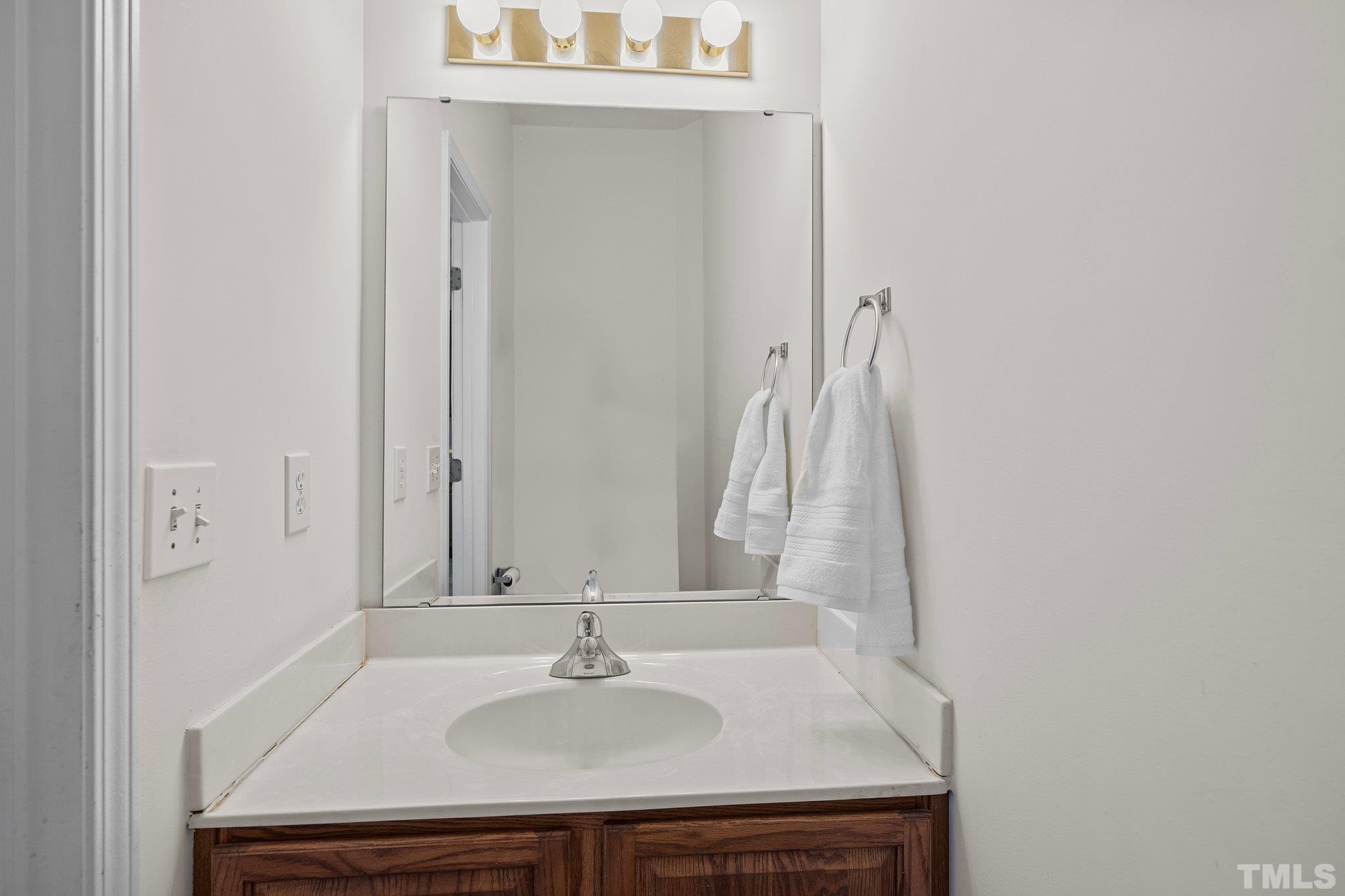 37 Lure Court Durham, NC 27713 - Photo 15 of 35 a bathroom with a sink and a mirror