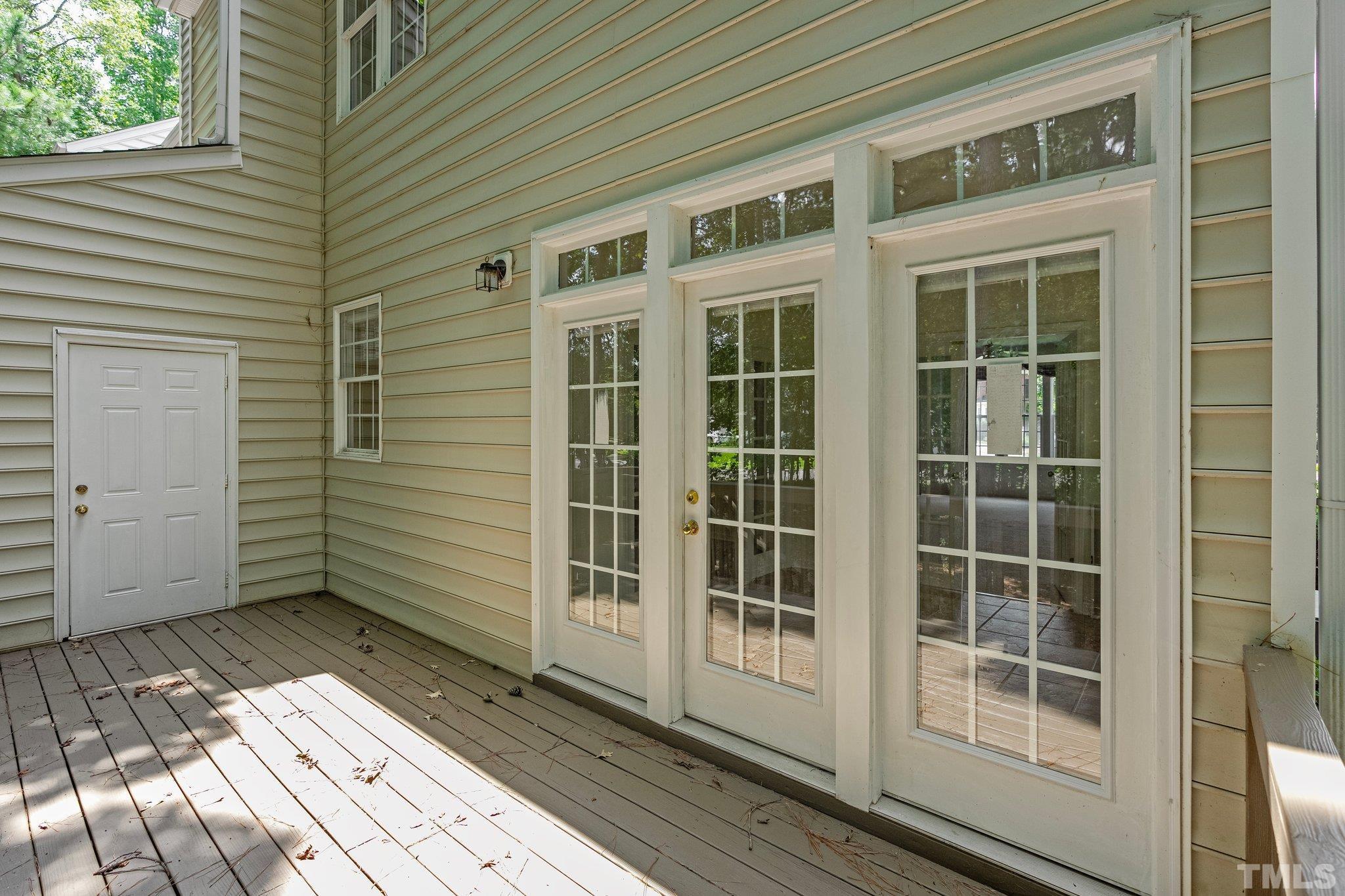 37 Lure Court Durham, NC 27713 - Photo 16 of 35 a view of a balcony with wooden floor