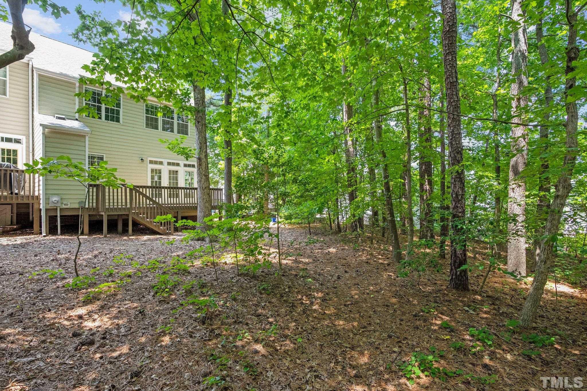 37 Lure Court Durham, NC 27713 - Photo 18 of 35 a view of a house with backyard and sitting area