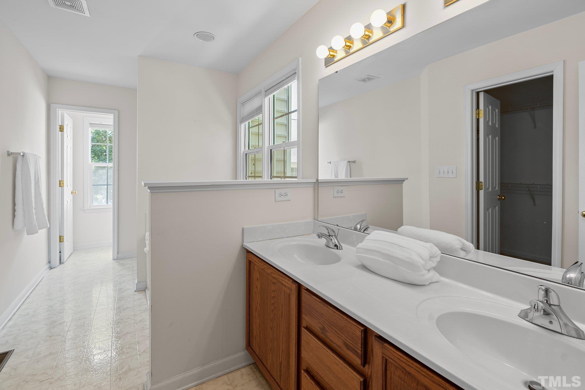 37 Lure Court Durham, NC 27713 - Photo 22 of 35 a bathroom with a sink and a mirror