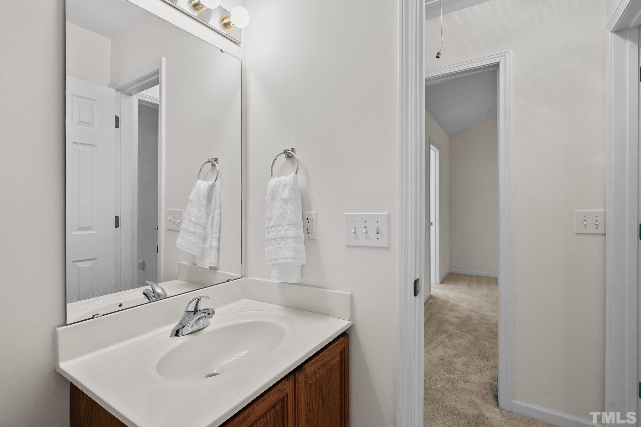37 Lure Court Durham, NC 27713 - Photo 27 of 35 a bathroom with a sink and a mirror