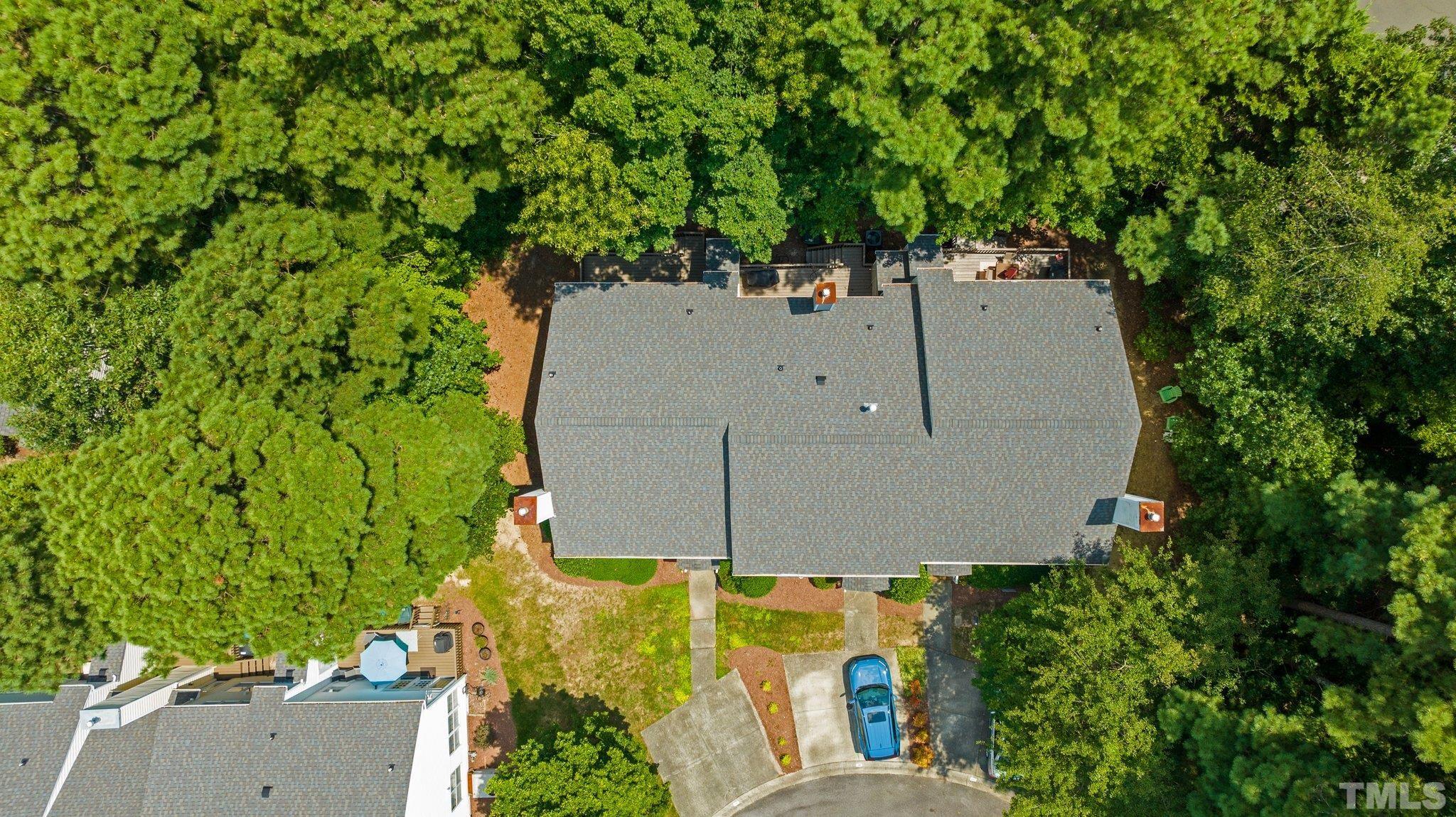 37 Lure Court Durham, NC 27713 - Photo 4 of 35 an aerial view of a house with swimming pool and large trees