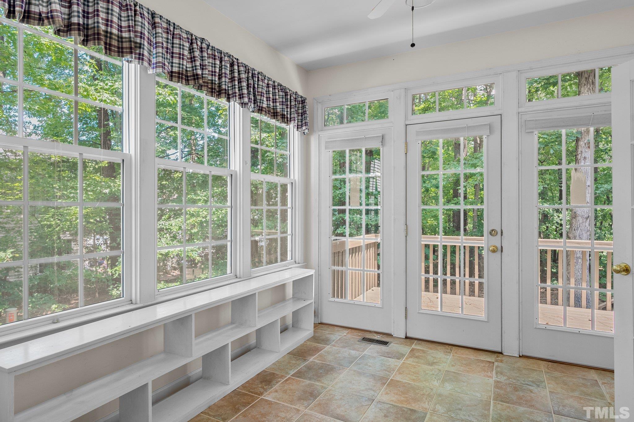 37 Lure Court Durham, NC 27713 - Photo 9 of 35 a view of an empty room with a balcony