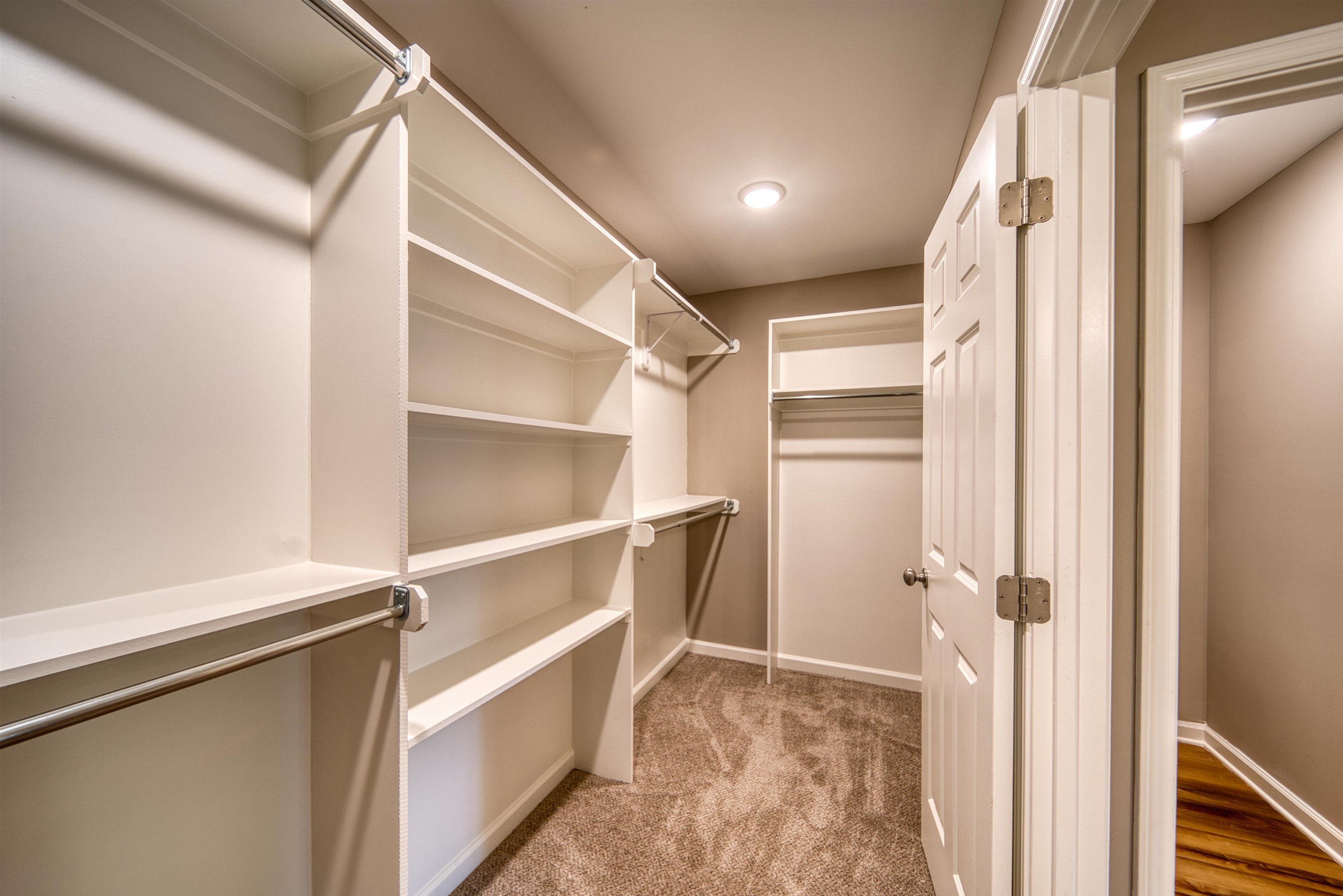 109 Walnut Ridge Ripley, TN 38063 - Photo 8 of 39 a view of walk in closet with empty racks