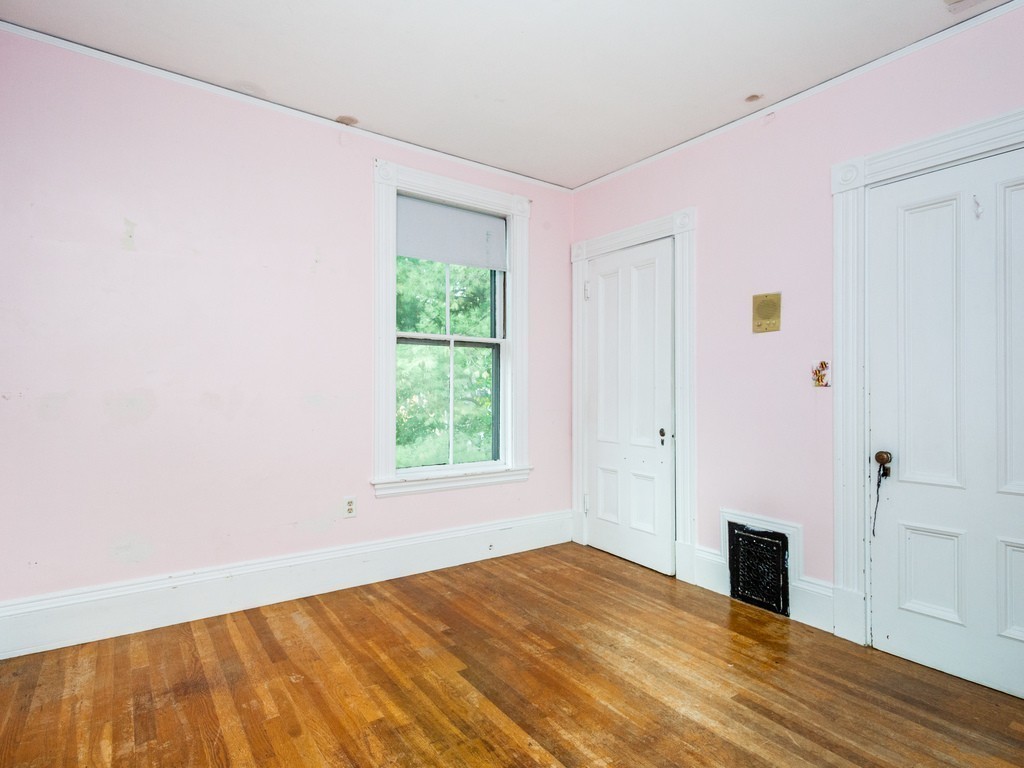 46 Gorham Avenue Brookline, MA 02445 - Photo 14 of 23 a view of empty room with wooden floor and fan