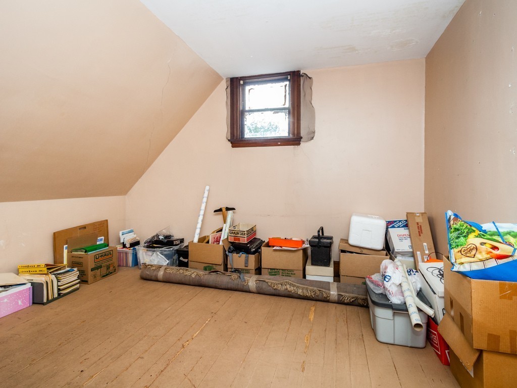 46 Gorham Avenue Brookline, MA 02445 - Photo 19 of 23 a room with furniture and a table