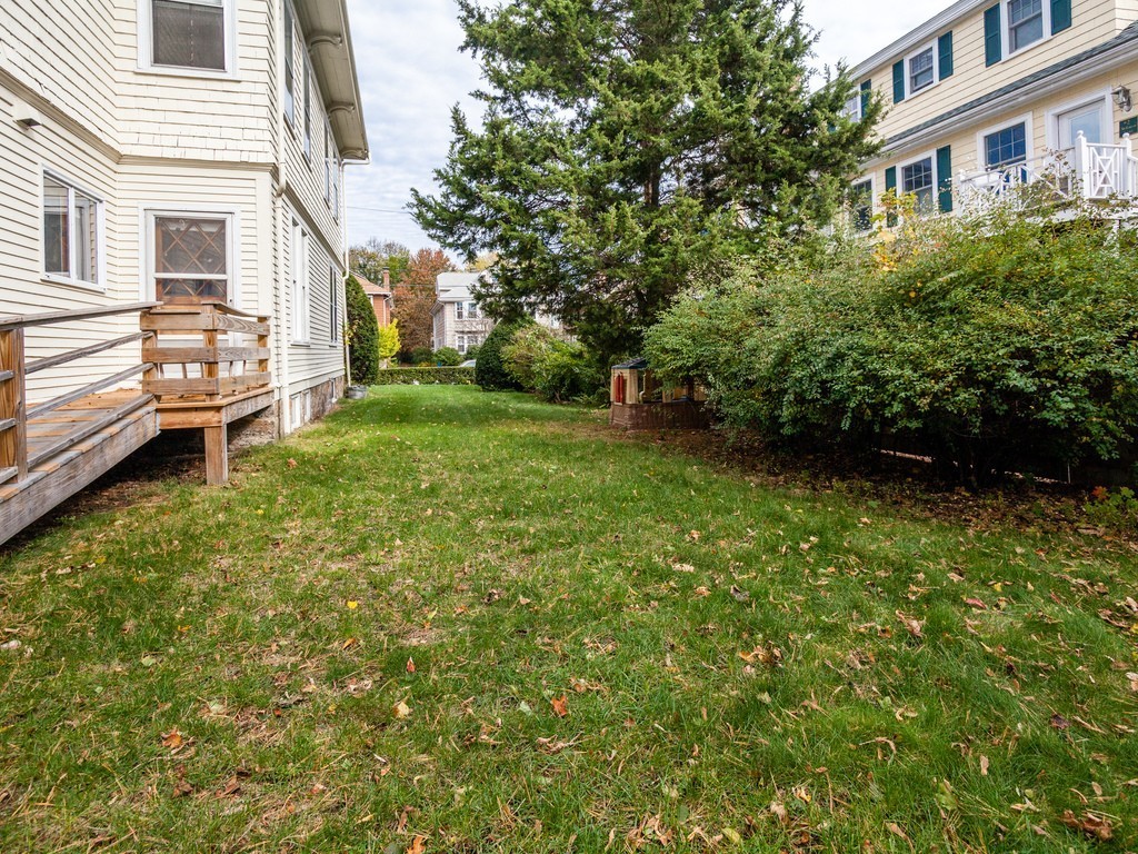 46 Gorham Avenue Brookline, MA 02445 - Photo 21 of 23 front view of a house with a yard