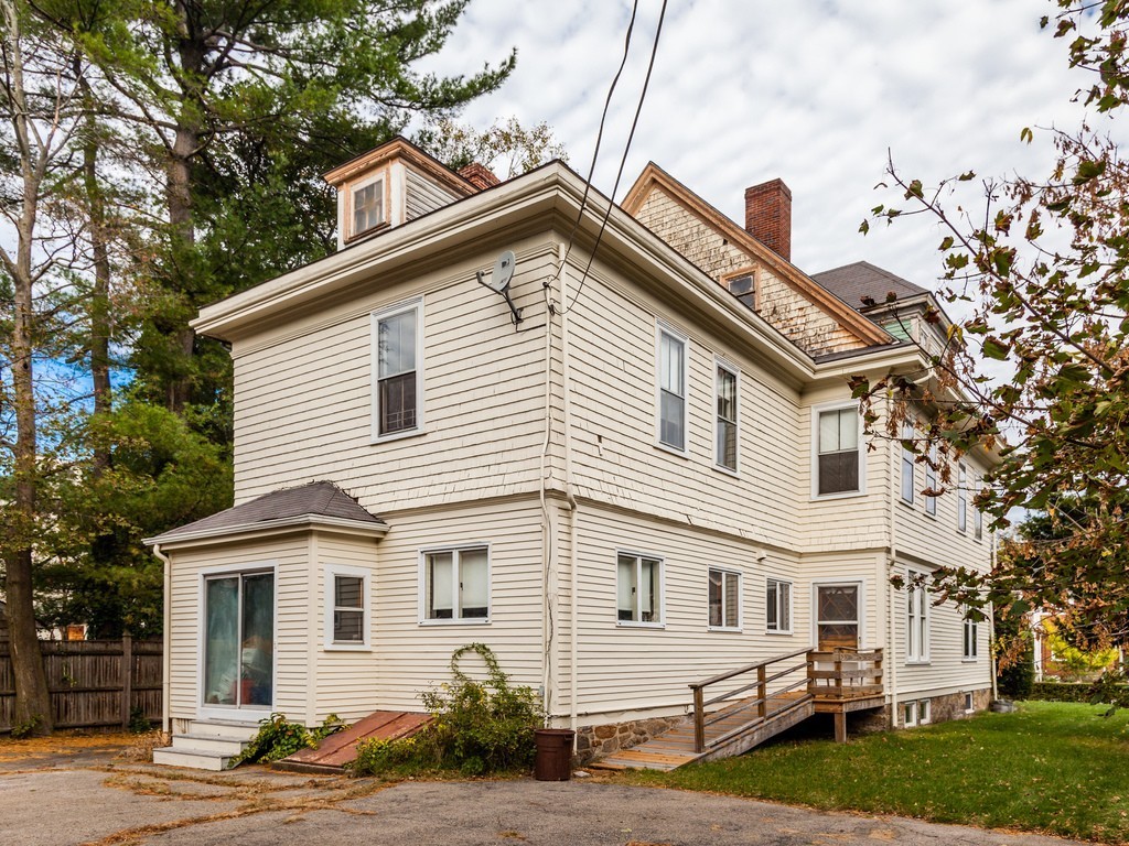 46 Gorham Avenue Brookline, MA 02445 - Photo 22 of 23 a front view of a house with a garden