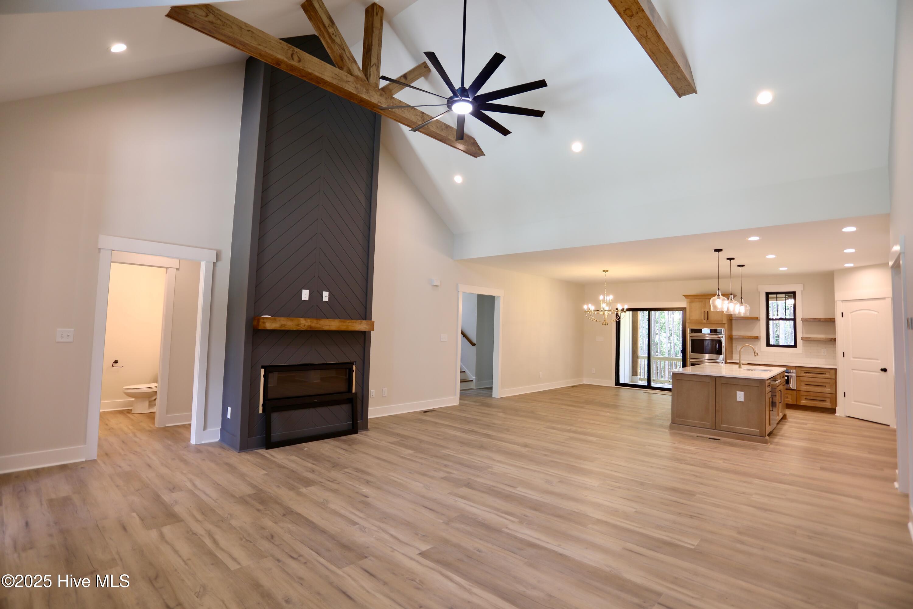 130 Gails Road West End, NC 27376 - Photo 7 of 61 Vaulted ceiling & electric fireplace in Living Room