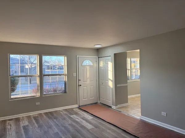 an empty room with windows