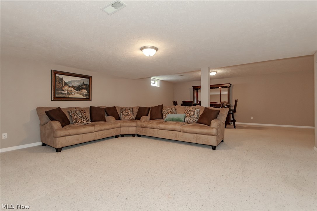 8375 Raleigh Place Painesville, OH 44077 - Photo 25 of 45 Great Space for sending Men and Boys trying to watch sports upstairs!