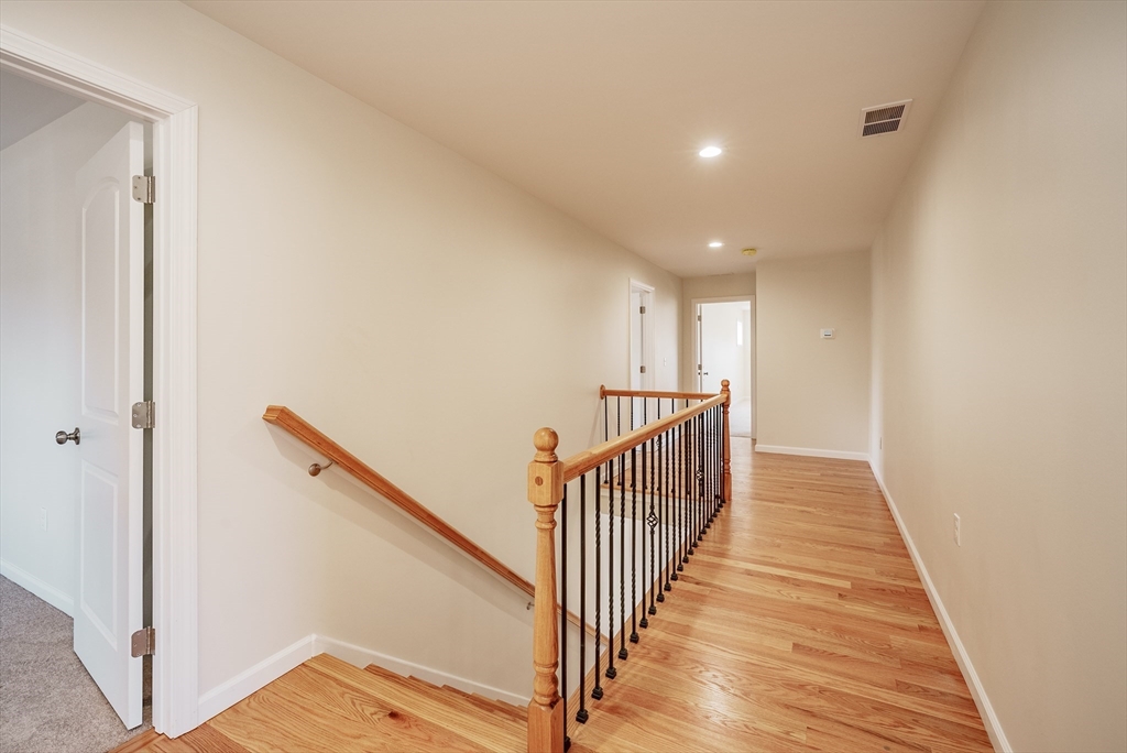 74 West Crystal Brook Drive Springfield, MA 01118 - Photo 14 of 31 a view of a hallway with wooden floor and entryway