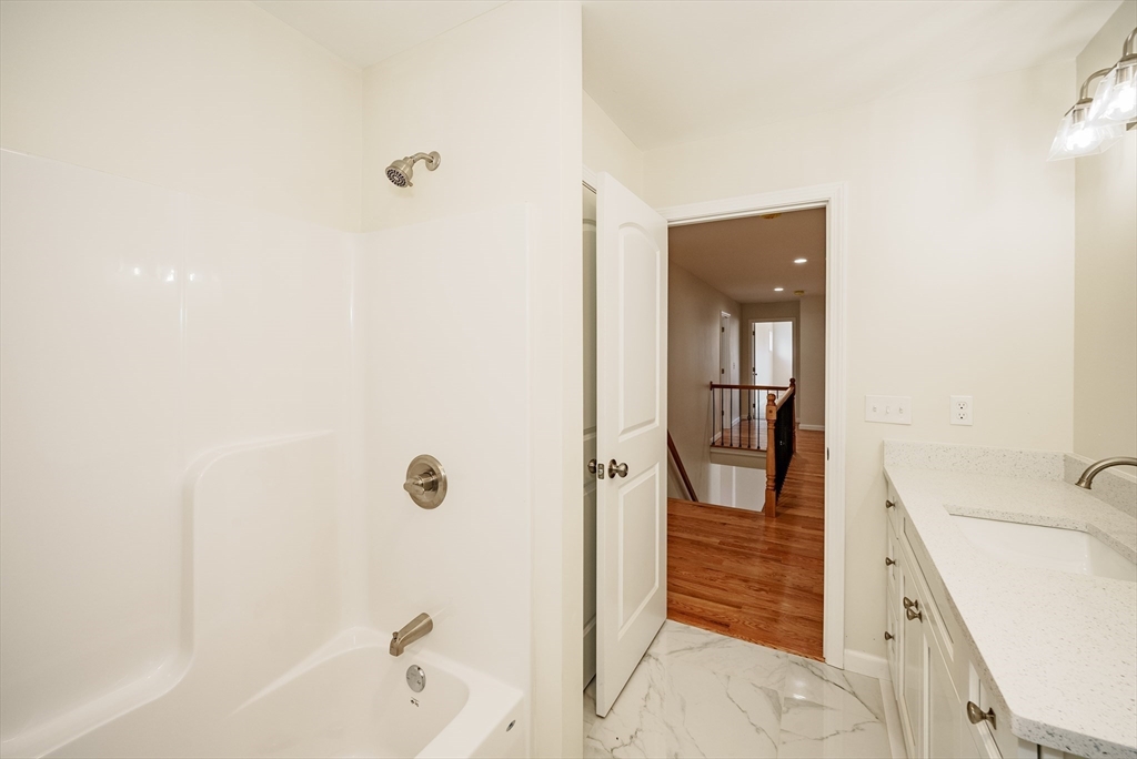 74 West Crystal Brook Drive Springfield, MA 01118 - Photo 18 of 31 a bathroom with a shower