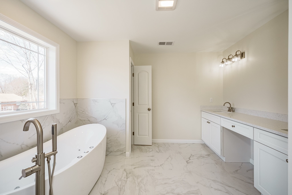 74 West Crystal Brook Drive Springfield, MA 01118 - Photo 22 of 31 a view of a bathroom sink and a window