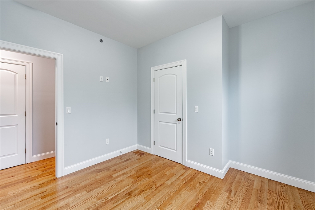 74 West Crystal Brook Drive Springfield, MA 01118 - Photo 27 of 31 a view of a room with wooden floor and closet