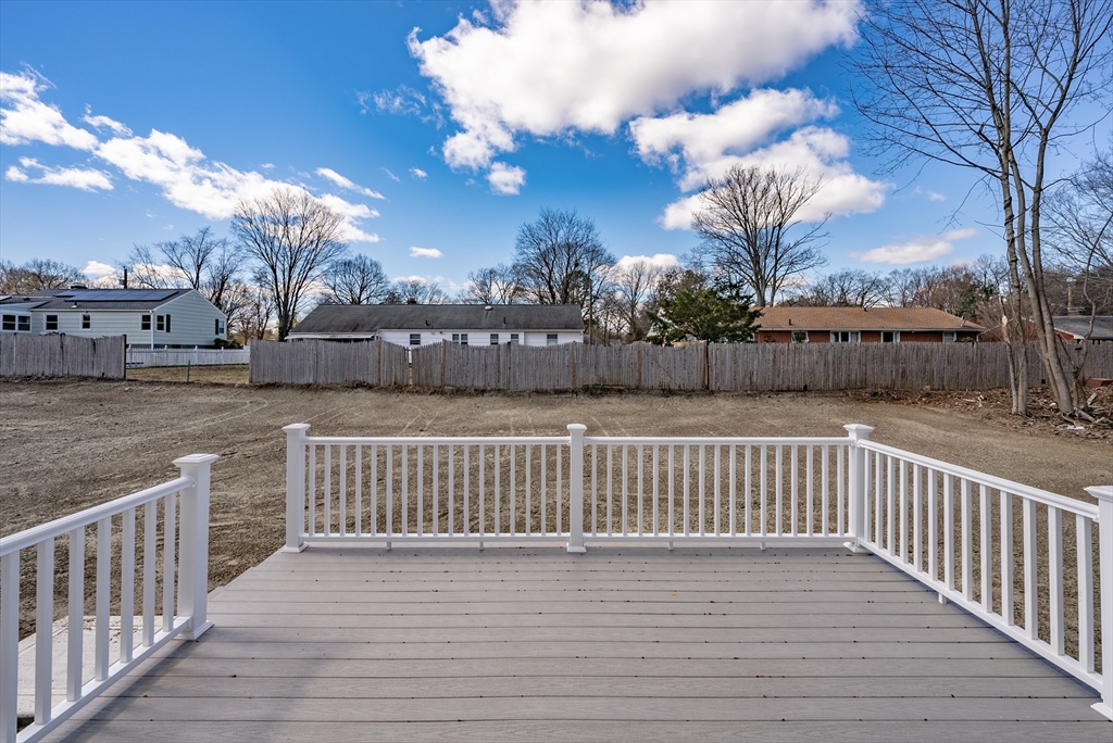 74 West Crystal Brook Drive Springfield, MA 01118 - Photo 29 of 31 a view of a balcony with a potted plants and wooden floor