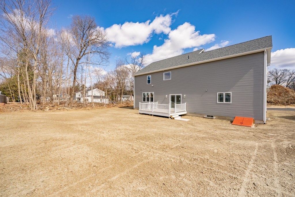 74 West Crystal Brook Drive Springfield, MA 01118 - Photo 30 of 31 a front view of house with yard