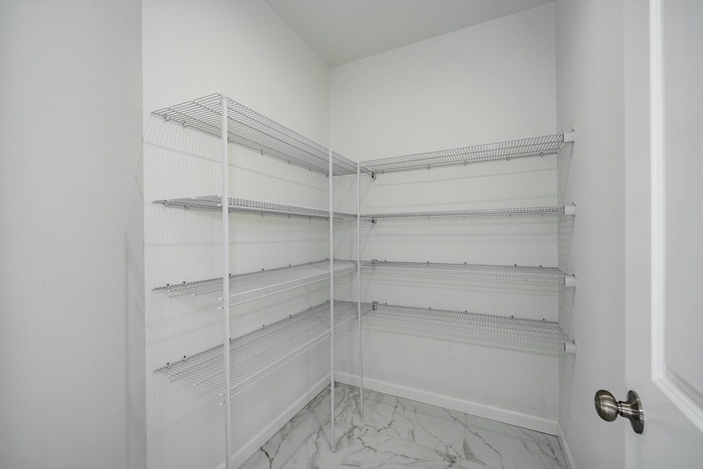 74 West Crystal Brook Drive Springfield, MA 01118 - Photo 9 of 31 a view of a room with shelf