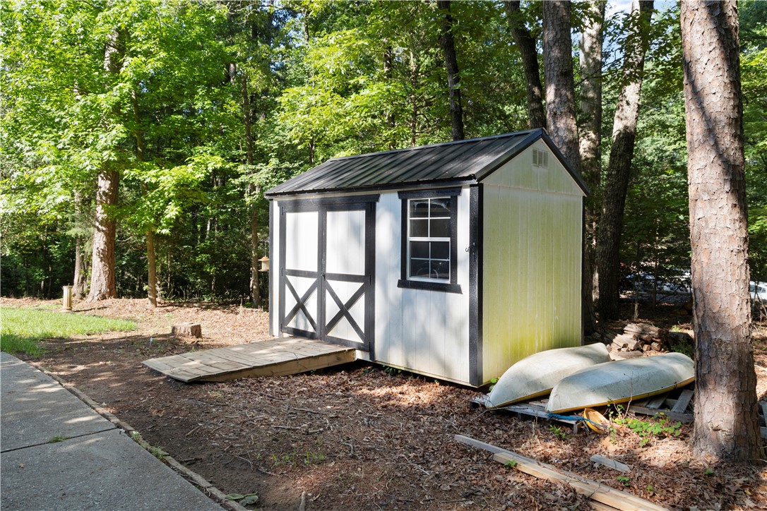 1298 Carradine Road Seneca, SC 29678 - Photo 39 of 43 A storage shed offers convenient organization for outdoor essentials.