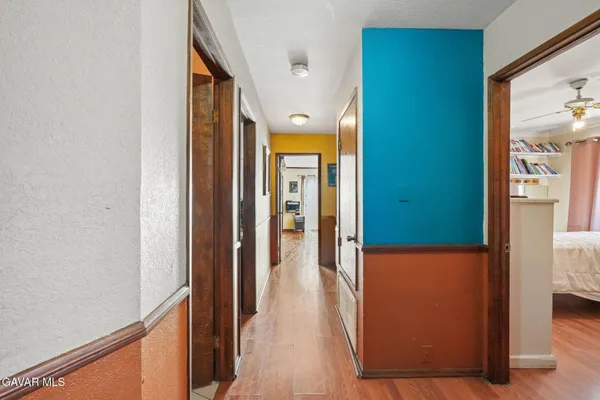 a bedroom with a bed and a table