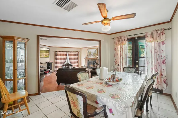 a view of a car park in front of a house