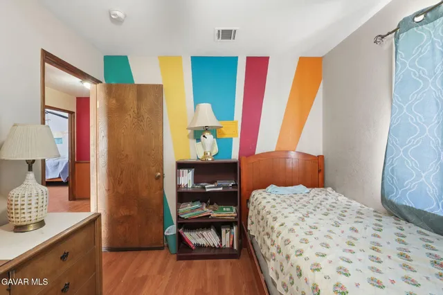 a bathroom with a toilet a sink and shower