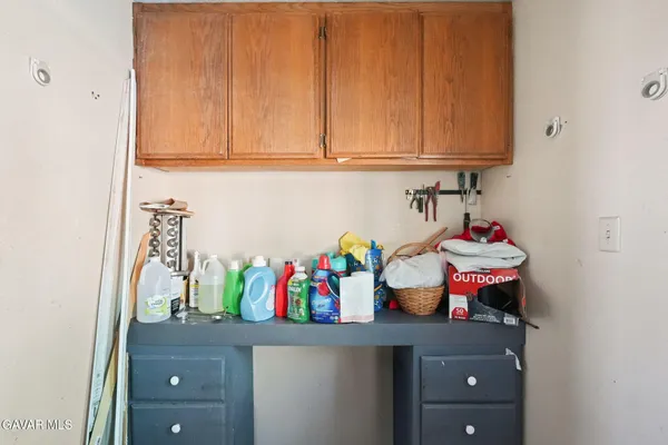 a bed room with bed and a window