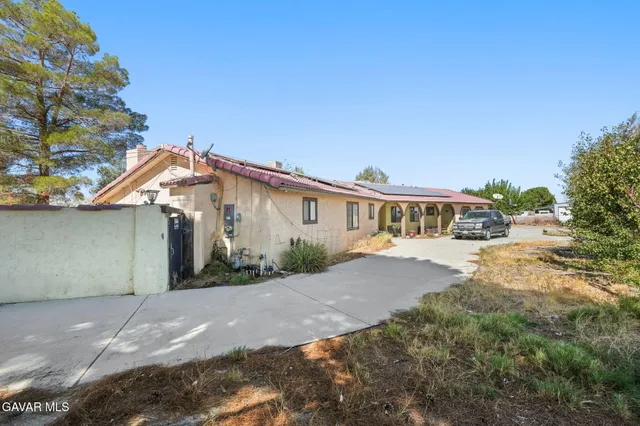 a view of a house with a swimming pool