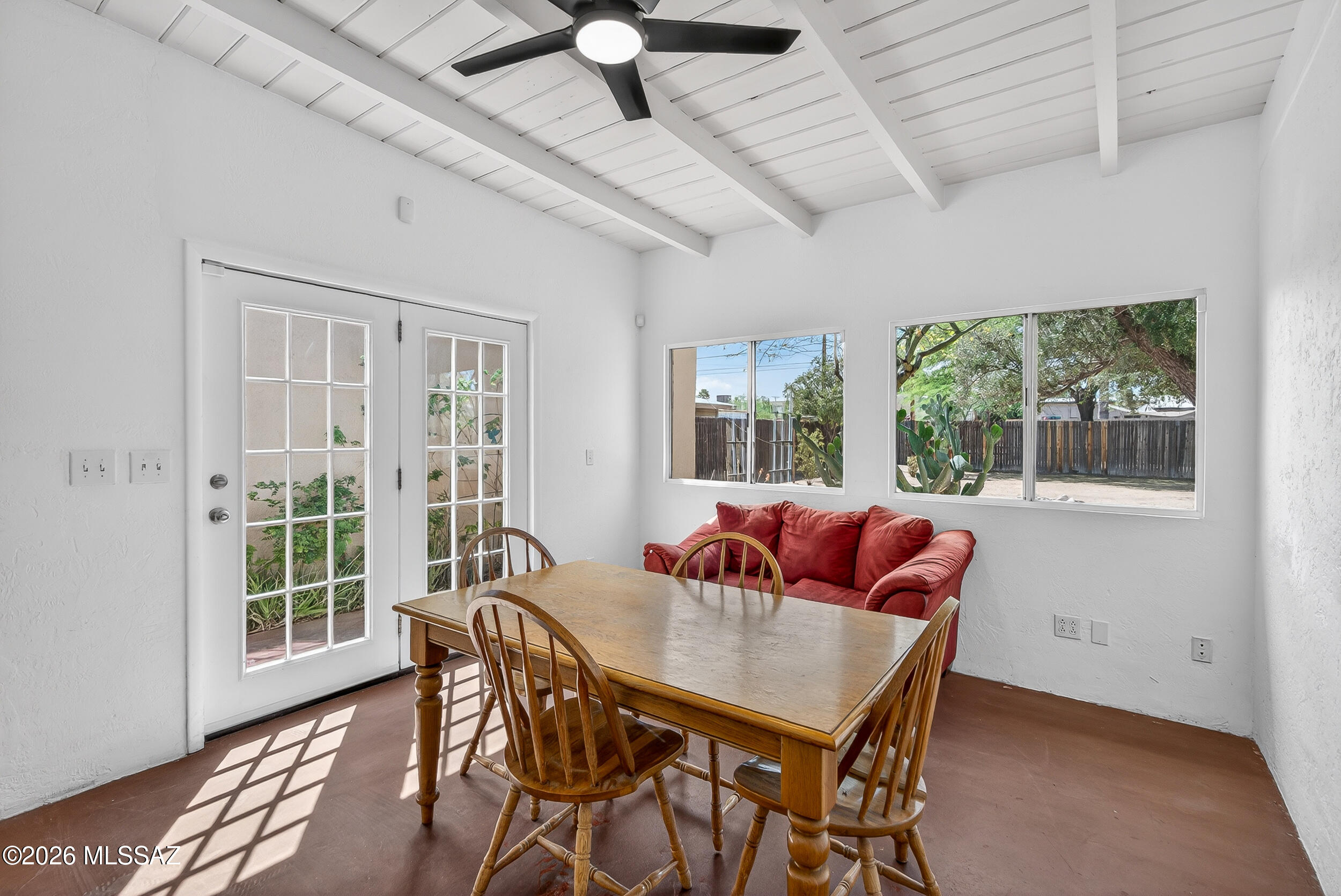 1412 East Spring Street Tucson, AZ 85719 - Photo 5 of 43 a view of a dining room with furniture window and outside view