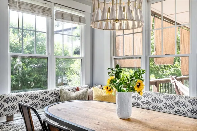 a view of a dining room with furniture window and garden