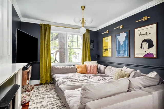 a bedroom with bed and window