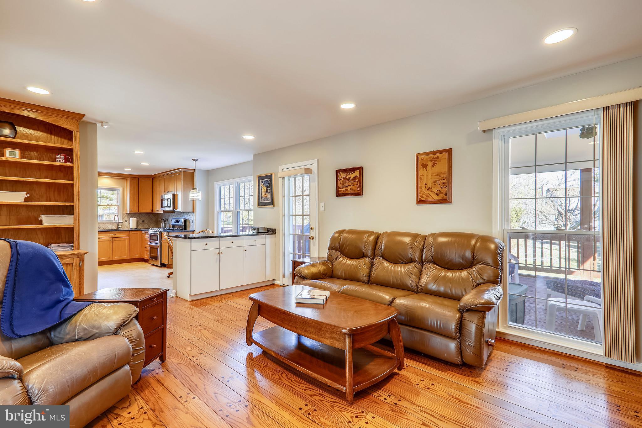 1613 Chester Mill Road Silver Spring, MD 20906 - Photo 15 of 38 Family room w access to screened in porch