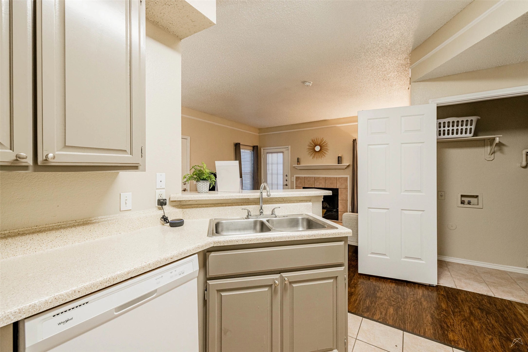 11908 Anderson Mill Road, Unit 312 Cedar Park, TX 78613 - Photo 19 of 25 a utility room with cabinets washer and dryer