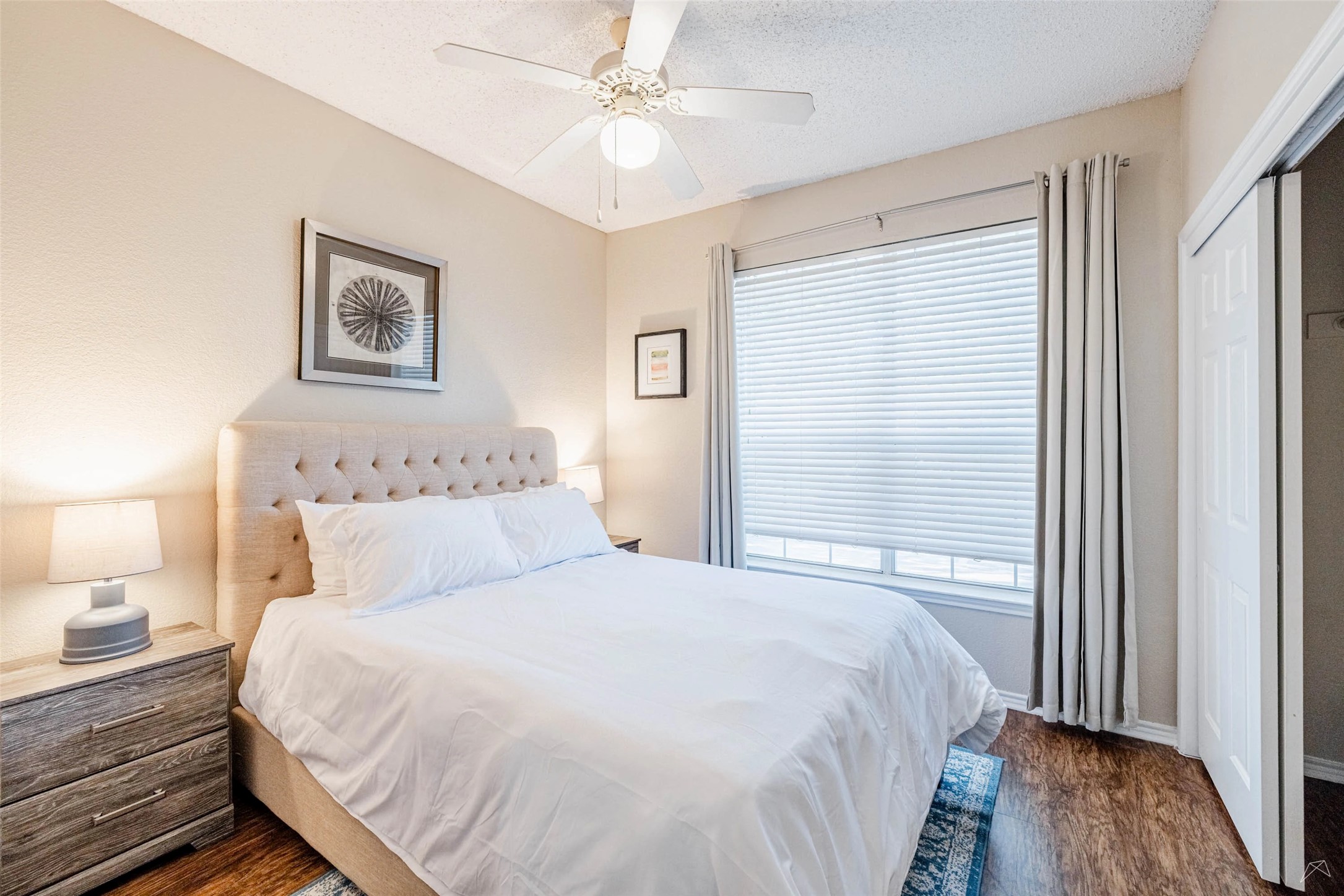 11908 Anderson Mill Road, Unit 312 Cedar Park, TX 78613 - Photo 10 of 25 a bedroom with a bed and a window